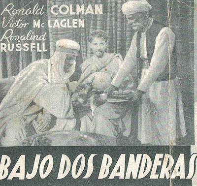 [Programa de mano de película]. Bajo dos Banderas. Interpretes: Ronald Colman, Victor Mclaglen, Rosalind Russell y Claudette Colbert.